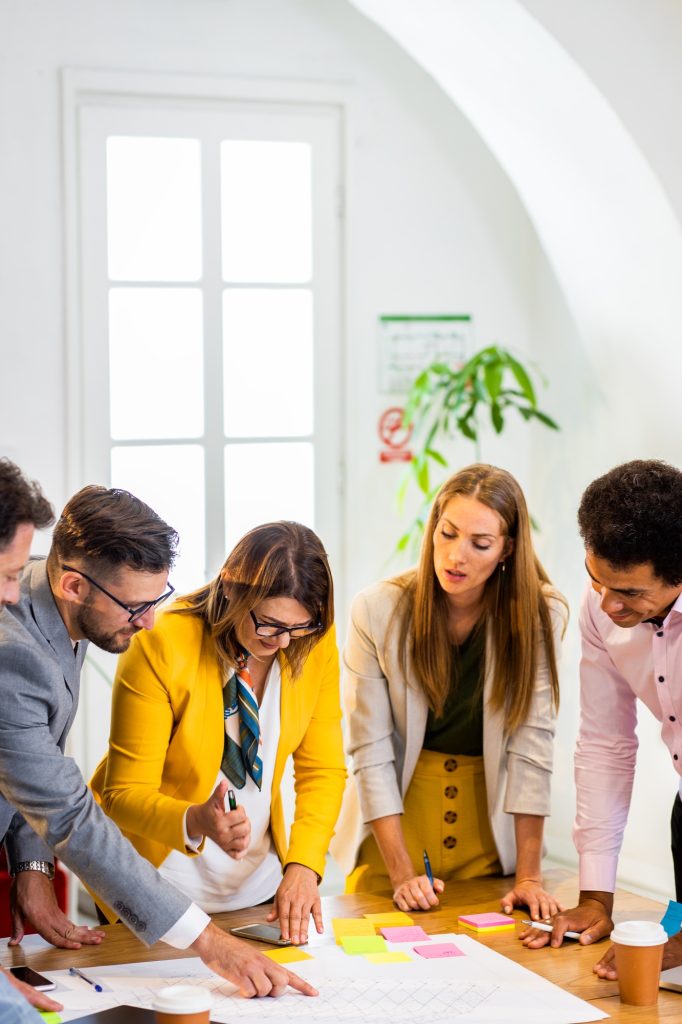 Group of business people working in office.